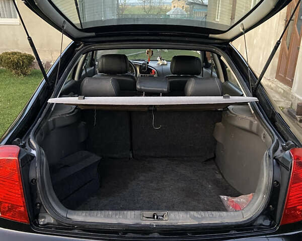 Черный Киа Шума, объемом двигателя 1.6 л и пробегом 308 тыс. км за 3100 $, фото 4 на Automoto.ua