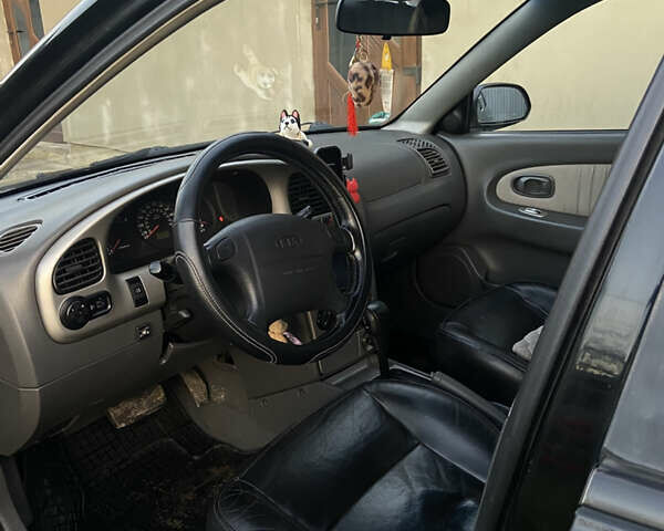 Черный Киа Шума, объемом двигателя 1.6 л и пробегом 308 тыс. км за 3100 $, фото 12 на Automoto.ua