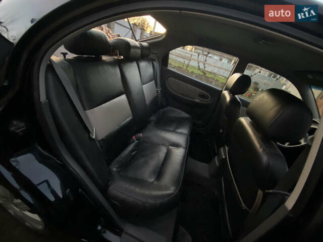 Черный Киа Шума, объемом двигателя 1.6 л и пробегом 308 тыс. км за 3100 $, фото 18 на Automoto.ua