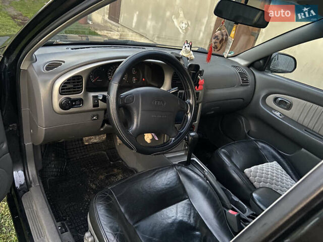 Черный Киа Шума, объемом двигателя 1.6 л и пробегом 308 тыс. км за 3100 $, фото 9 на Automoto.ua