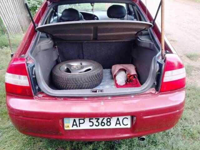 Красный Киа Шума, объемом двигателя 1.5 л и пробегом 170 тыс. км за 1850 $, фото 2 на Automoto.ua