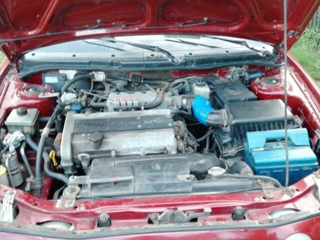 Красный Киа Шума, объемом двигателя 1.5 л и пробегом 170 тыс. км за 1850 $, фото 3 на Automoto.ua