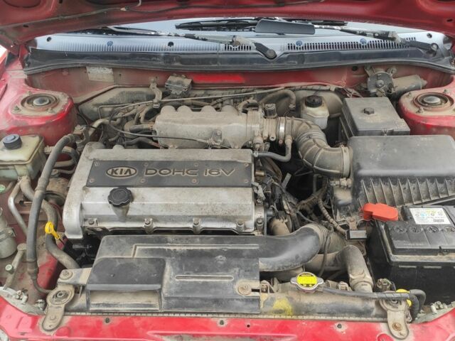 Червоний Кіа Шума, об'ємом двигуна 1.5 л та пробігом 1 тис. км за 1850 $, фото 12 на Automoto.ua