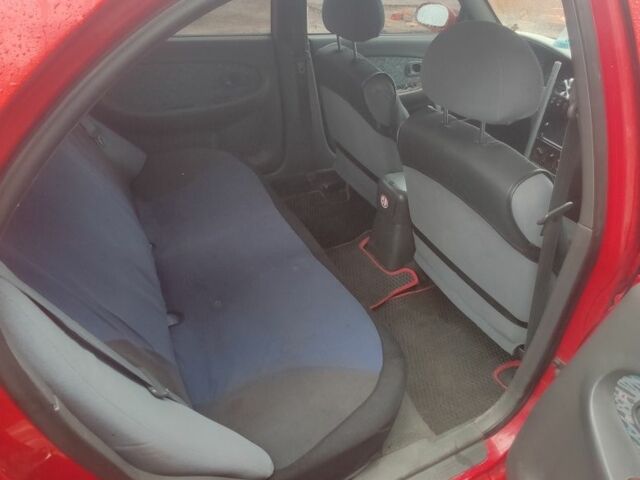 Червоний Кіа Шума, об'ємом двигуна 1.5 л та пробігом 1 тис. км за 1850 $, фото 10 на Automoto.ua