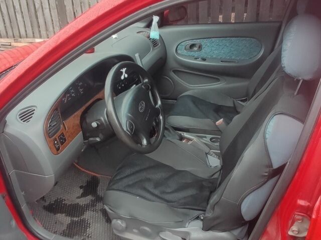 Червоний Кіа Шума, об'ємом двигуна 1.5 л та пробігом 1 тис. км за 1850 $, фото 7 на Automoto.ua