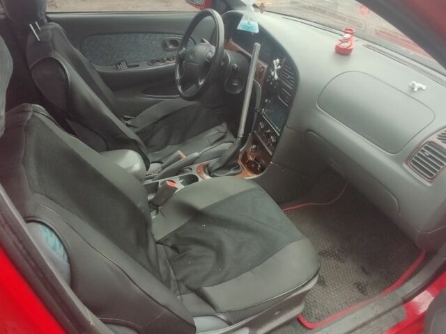 Червоний Кіа Шума, об'ємом двигуна 1.5 л та пробігом 1 тис. км за 1850 $, фото 9 на Automoto.ua