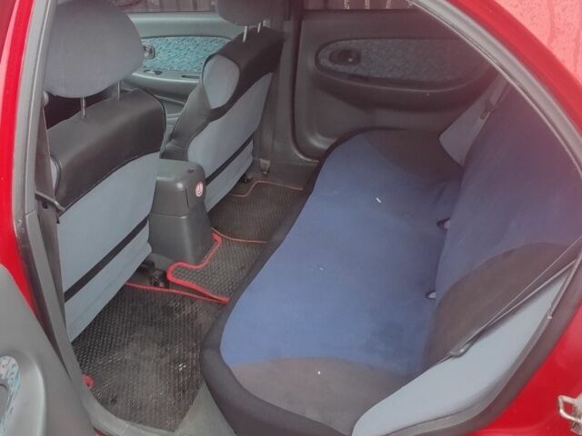 Червоний Кіа Шума, об'ємом двигуна 1.5 л та пробігом 1 тис. км за 1850 $, фото 8 на Automoto.ua