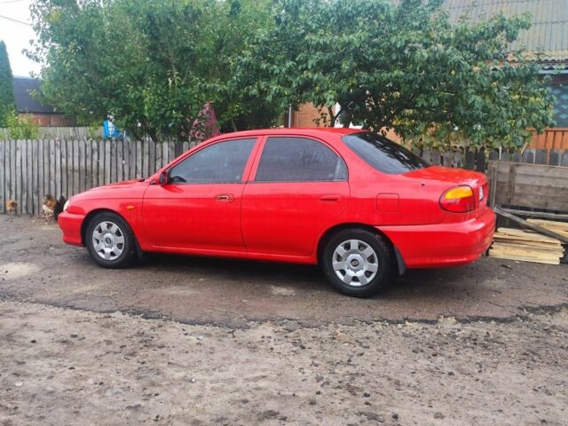 Червоний Кіа Шума, об'ємом двигуна 1.5 л та пробігом 1 тис. км за 1850 $, фото 4 на Automoto.ua