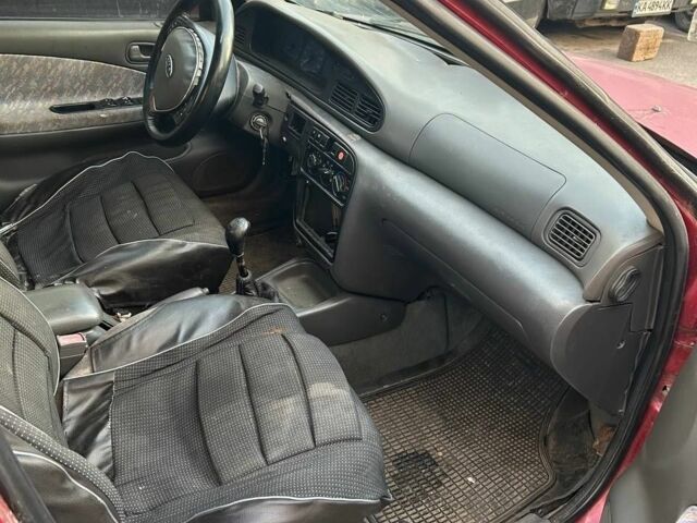 Красный Киа Шума, объемом двигателя 1.5 л и пробегом 1 тыс. км за 500 $, фото 1 на Automoto.ua