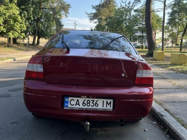 Красный Киа Шума, объемом двигателя 1.5 л и пробегом 215 тыс. км за 1700 $, фото 9 на Automoto.ua