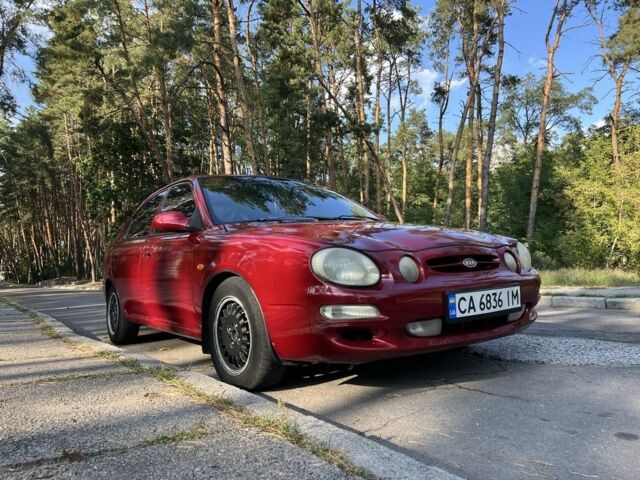 Красный Киа Шума, объемом двигателя 1.5 л и пробегом 215 тыс. км за 1700 $, фото 2 на Automoto.ua