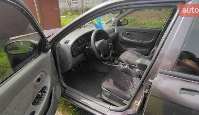 Сірий Кіа Шума, об'ємом двигуна 1.5 л та пробігом 380 тис. км за 2200 $, фото 1 на Automoto.ua