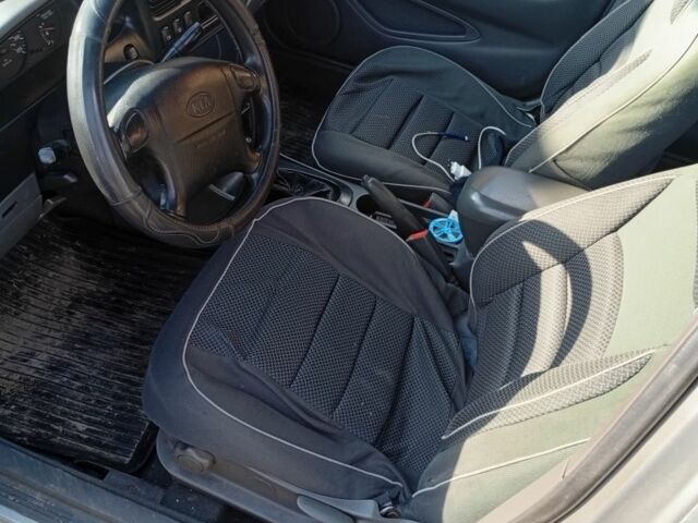 Сірий Кіа Шума, об'ємом двигуна 1.5 л та пробігом 278 тис. км за 1500 $, фото 5 на Automoto.ua