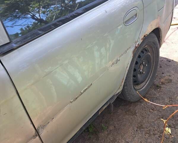 Сірий Кіа Шума, об'ємом двигуна 1.5 л та пробігом 380 тис. км за 1300 $, фото 2 на Automoto.ua