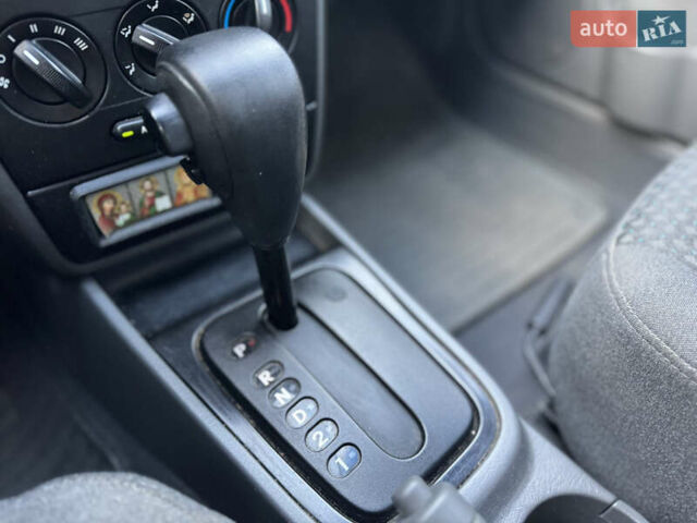 Сірий Кіа Шума, об'ємом двигуна 1.6 л та пробігом 160 тис. км за 3200 $, фото 13 на Automoto.ua