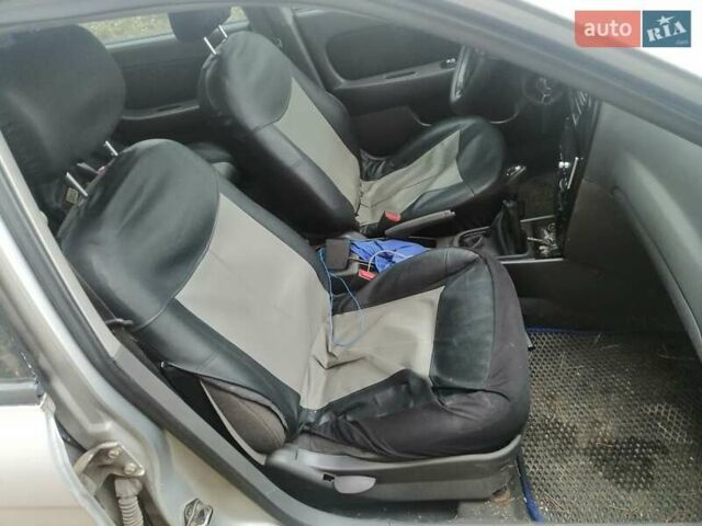 Серый Киа Шума, объемом двигателя 1.59 л и пробегом 430 тыс. км за 1200 $, фото 1 на Automoto.ua