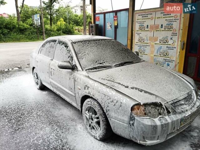 Сірий Кіа Шума, об'ємом двигуна 1.6 л та пробігом 255 тис. км за 1950 $, фото 10 на Automoto.ua