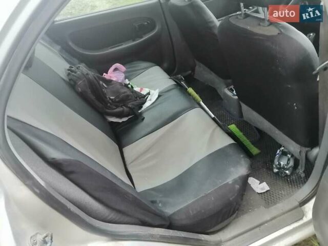 Серый Киа Шума, объемом двигателя 1.59 л и пробегом 430 тыс. км за 1200 $, фото 10 на Automoto.ua