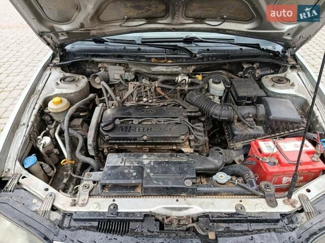 Серый Киа Шума, объемом двигателя 1.6 л и пробегом 300 тыс. км за 2499 $, фото 9 на Automoto.ua