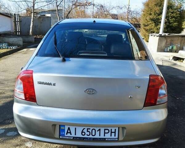 Серый Киа Шума, объемом двигателя 1.6 л и пробегом 171 тыс. км за 2950 $, фото 3 на Automoto.ua