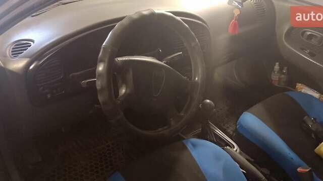 Серый Киа Шума, объемом двигателя 1.6 л и пробегом 120 тыс. км за 1300 $, фото 7 на Automoto.ua