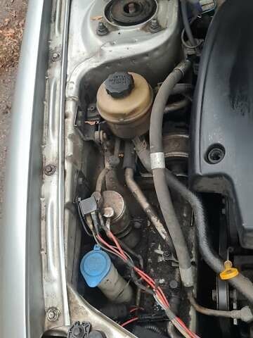 Сірий Кіа Шума, об'ємом двигуна 1.6 л та пробігом 240 тис. км за 1700 $, фото 11 на Automoto.ua