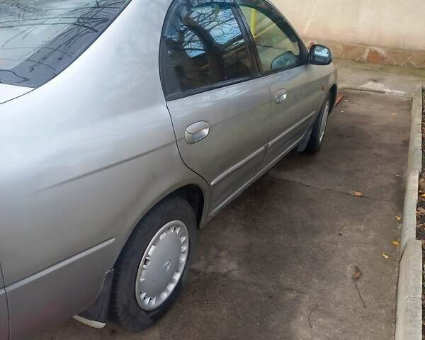 Серый Киа Шума, объемом двигателя 1.6 л и пробегом 313 тыс. км за 3000 $, фото 2 на Automoto.ua