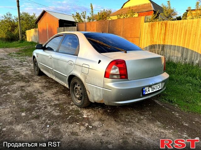 Сірий Кіа Шума, об'ємом двигуна 1.8 л та пробігом 245 тис. км за 1300 $, фото 6 на Automoto.ua
