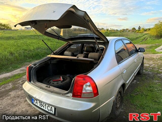 Сірий Кіа Шума, об'ємом двигуна 1.8 л та пробігом 245 тис. км за 1300 $, фото 7 на Automoto.ua