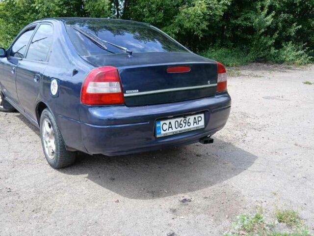 Синий Киа Шума, объемом двигателя 1.5 л и пробегом 400 тыс. км за 1150 $, фото 1 на Automoto.ua