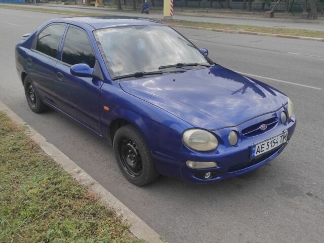 Синий Киа Шума, объемом двигателя 1.5 л и пробегом 320 тыс. км за 1300 $, фото 3 на Automoto.ua
