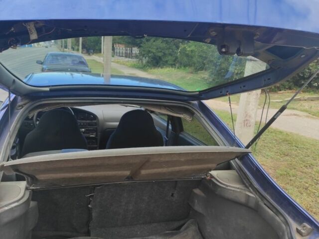 Синий Киа Шума, объемом двигателя 1.5 л и пробегом 320 тыс. км за 1300 $, фото 2 на Automoto.ua