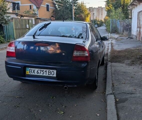 Синий Киа Шума, объемом двигателя 1.5 л и пробегом 260 тыс. км за 1650 $, фото 3 на Automoto.ua