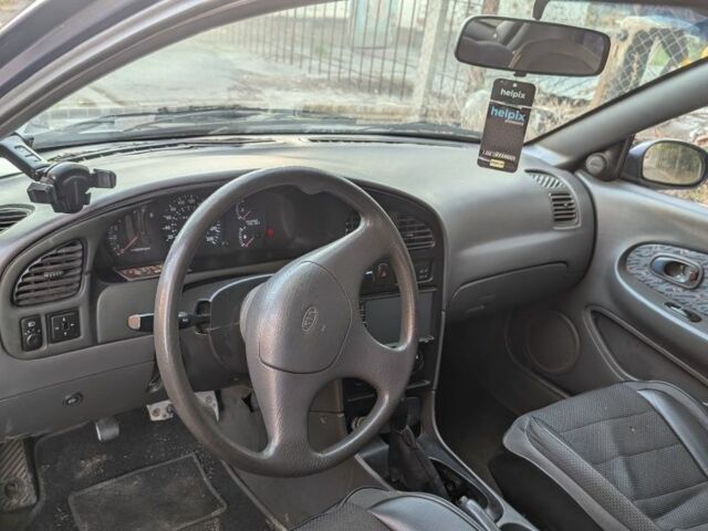 Синий Киа Шума, объемом двигателя 1.5 л и пробегом 260 тыс. км за 1300 $, фото 7 на Automoto.ua