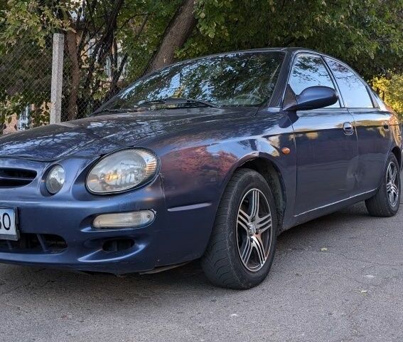 Синий Киа Шума, объемом двигателя 1.5 л и пробегом 260 тыс. км за 1650 $, фото 1 на Automoto.ua