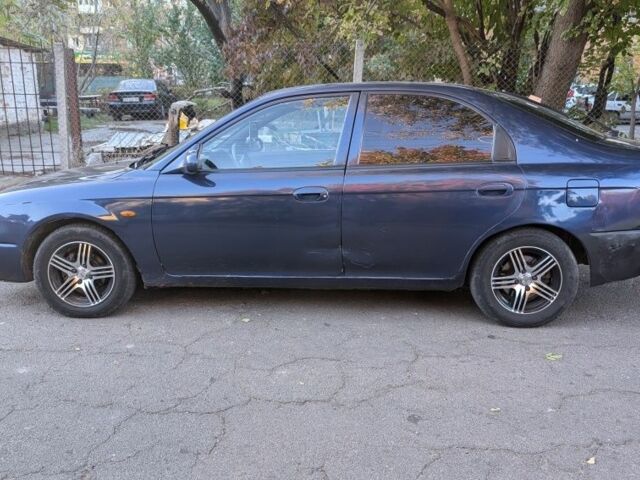 Синий Киа Шума, объемом двигателя 1.5 л и пробегом 260 тыс. км за 1300 $, фото 5 на Automoto.ua