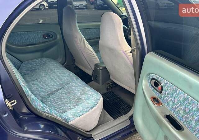 Синий Киа Шума, объемом двигателя 1.8 л и пробегом 310 тыс. км за 1500 $, фото 6 на Automoto.ua