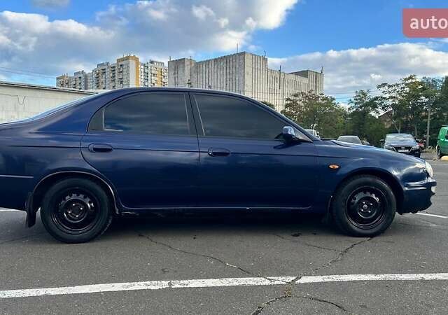 Синий Киа Шума, объемом двигателя 1.8 л и пробегом 310 тыс. км за 1500 $, фото 5 на Automoto.ua