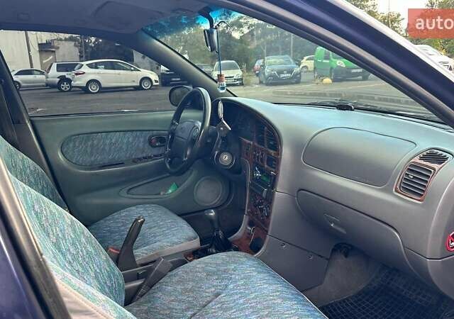 Синий Киа Шума, объемом двигателя 1.8 л и пробегом 310 тыс. км за 1500 $, фото 9 на Automoto.ua