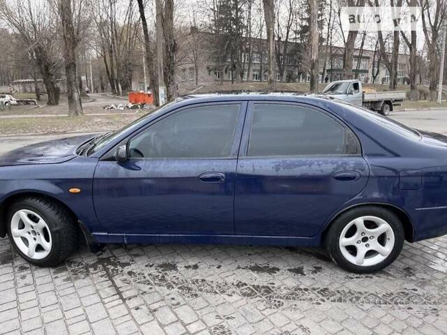 Синій Кіа Шума, об'ємом двигуна 1.5 л та пробігом 441 тис. км за 2400 $, фото 6 на Automoto.ua