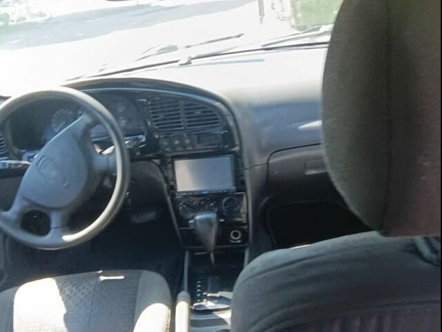 Синій Кіа Шума, об'ємом двигуна 1.6 л та пробігом 300 тис. км за 1200 $, фото 4 на Automoto.ua