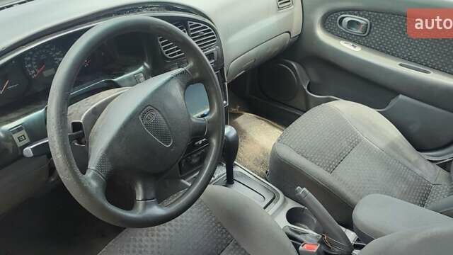 Синий Киа Шума, объемом двигателя 1.8 л и пробегом 561 тыс. км за 1200 $, фото 7 на Automoto.ua