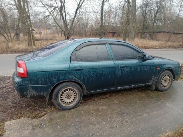 Зеленый Киа Шума, объемом двигателя 1.5 л и пробегом 460 тыс. км за 1000 $, фото 4 на Automoto.ua