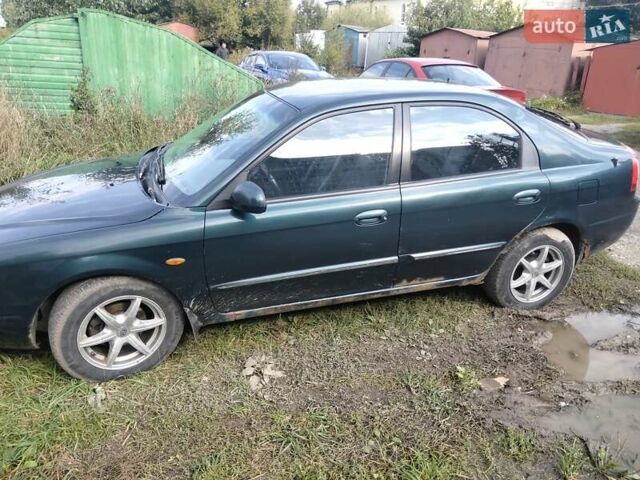 Зеленый Киа Шума, объемом двигателя 1.8 л и пробегом 130 тыс. км за 2600 $, фото 11 на Automoto.ua