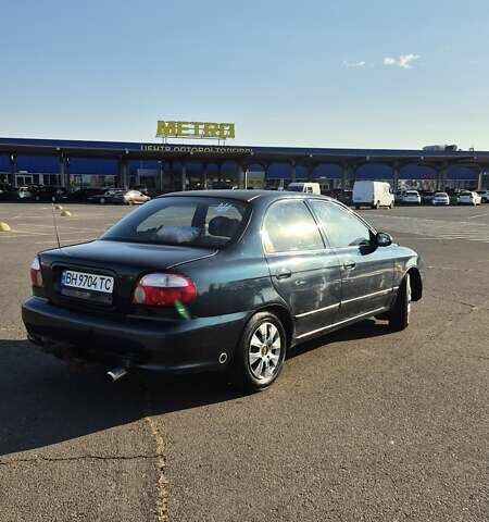 Зеленый Киа Шума, объемом двигателя 1.5 л и пробегом 328 тыс. км за 2000 $, фото 8 на Automoto.ua