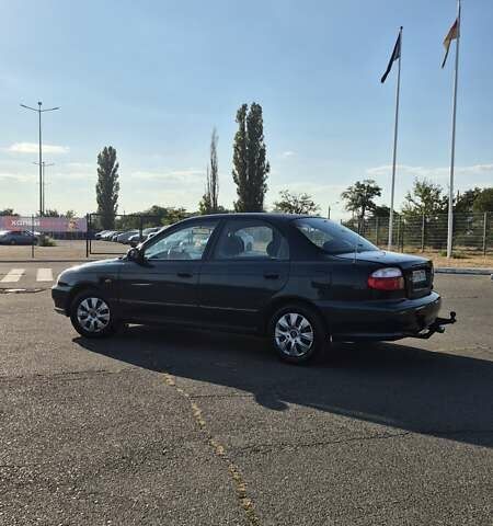 Зеленый Киа Шума, объемом двигателя 1.5 л и пробегом 328 тыс. км за 2000 $, фото 5 на Automoto.ua