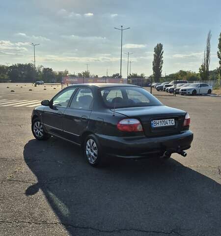 Зеленый Киа Шума, объемом двигателя 1.5 л и пробегом 328 тыс. км за 2300 $, фото 6 на Automoto.ua