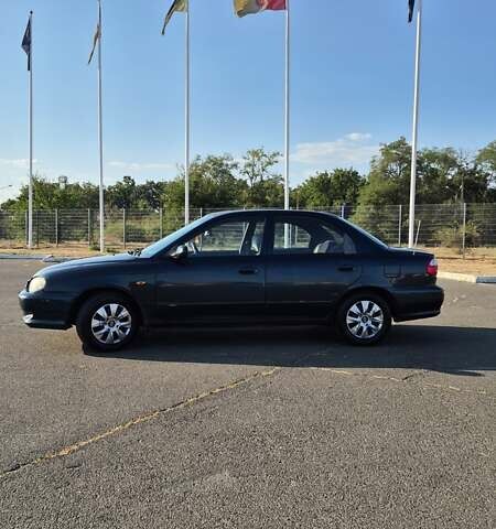 Зеленый Киа Шума, объемом двигателя 1.5 л и пробегом 328 тыс. км за 2000 $, фото 4 на Automoto.ua