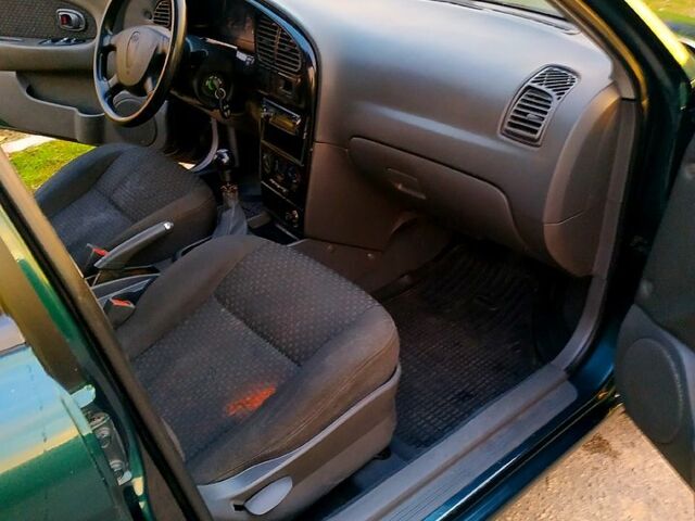 Киа Шума 2003 в Новой Одессе на Automoto.ua Зеленый Киа Шума, объемом двигателя 1.6 л и пробегом 250 тыс. км за 1950 $, фото 9 на Automoto.ua