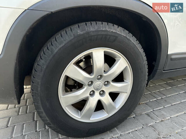 Белый Киа Соренто, объемом двигателя 2.4 л и пробегом 215 тыс. км за 11400 $, фото 18 на Automoto.ua